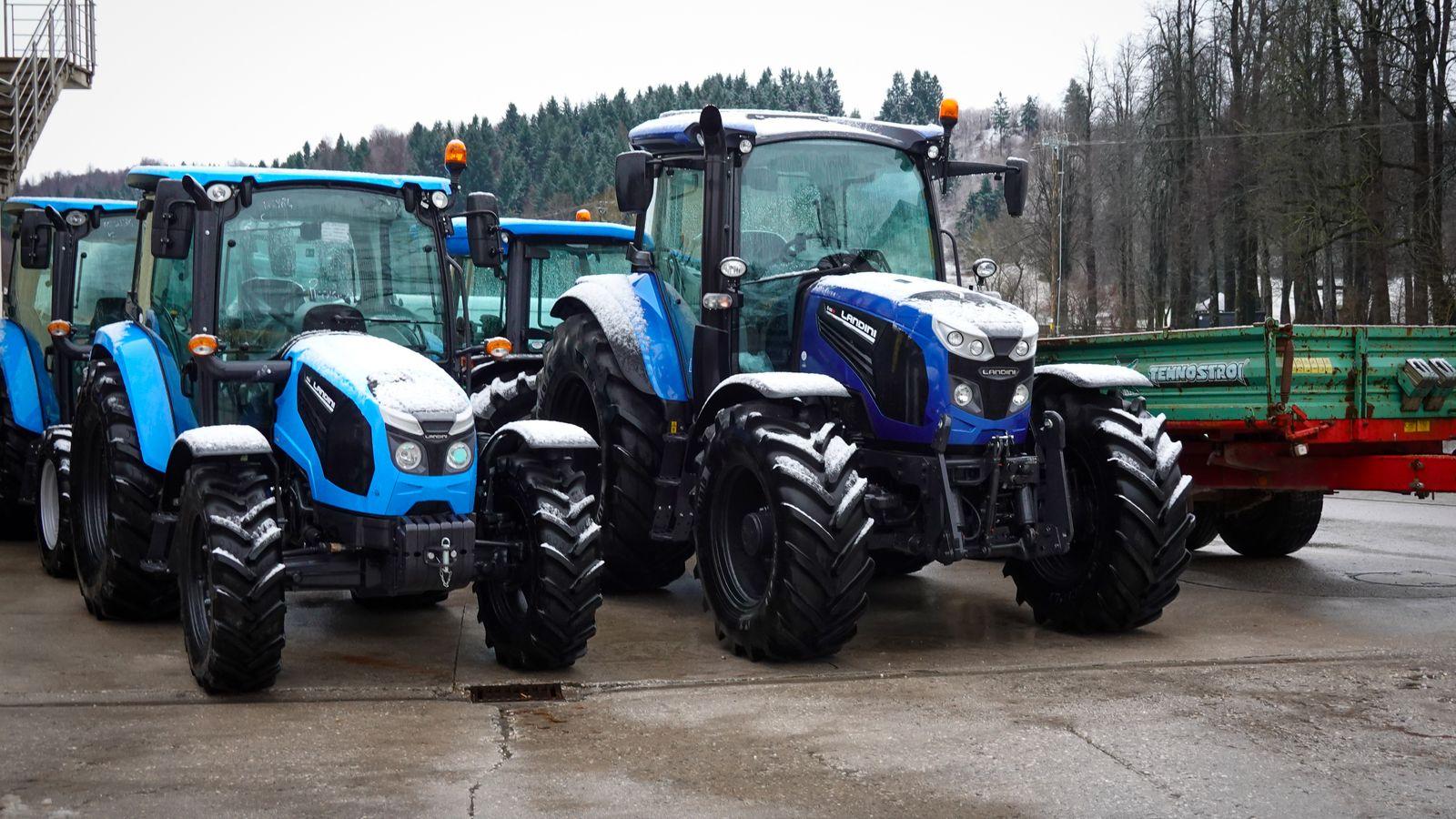 Row of new EU-built tractors on a dealer lot, the kind of imported farm equipment covered by the 2026 agricultural equipment import duty cut from 25% to 15%